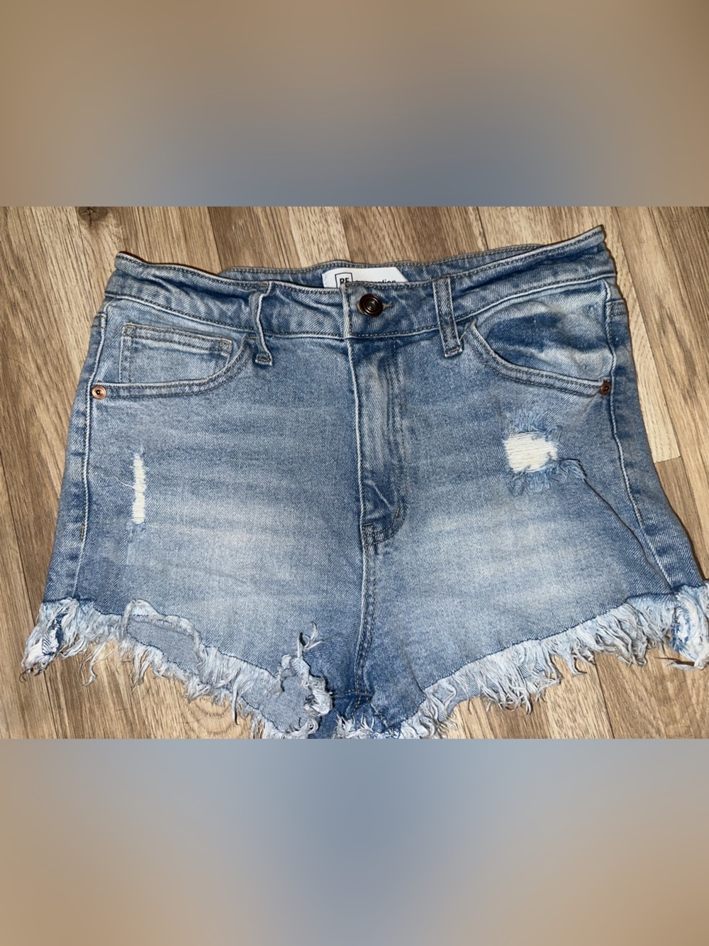 Women’s Light Blue Distressed Denim Shorts with Frayed Hem